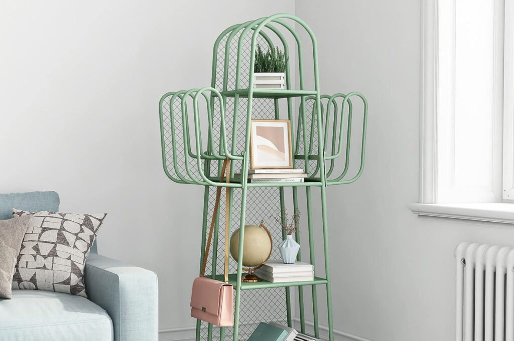 A cactus-shaped freestanding bookshelf in the corner of a living room