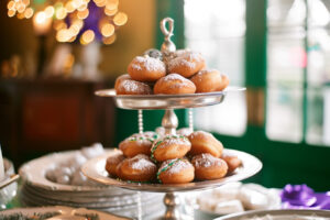 Beignets sitting on a tower of small trays